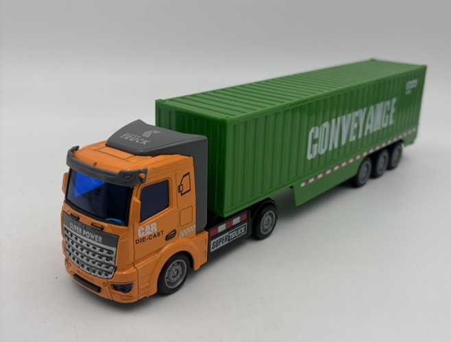 ماشین فلزی تریلی کانتینردار با کشنده نارنجی و کانتینر سبز کد 2212/2