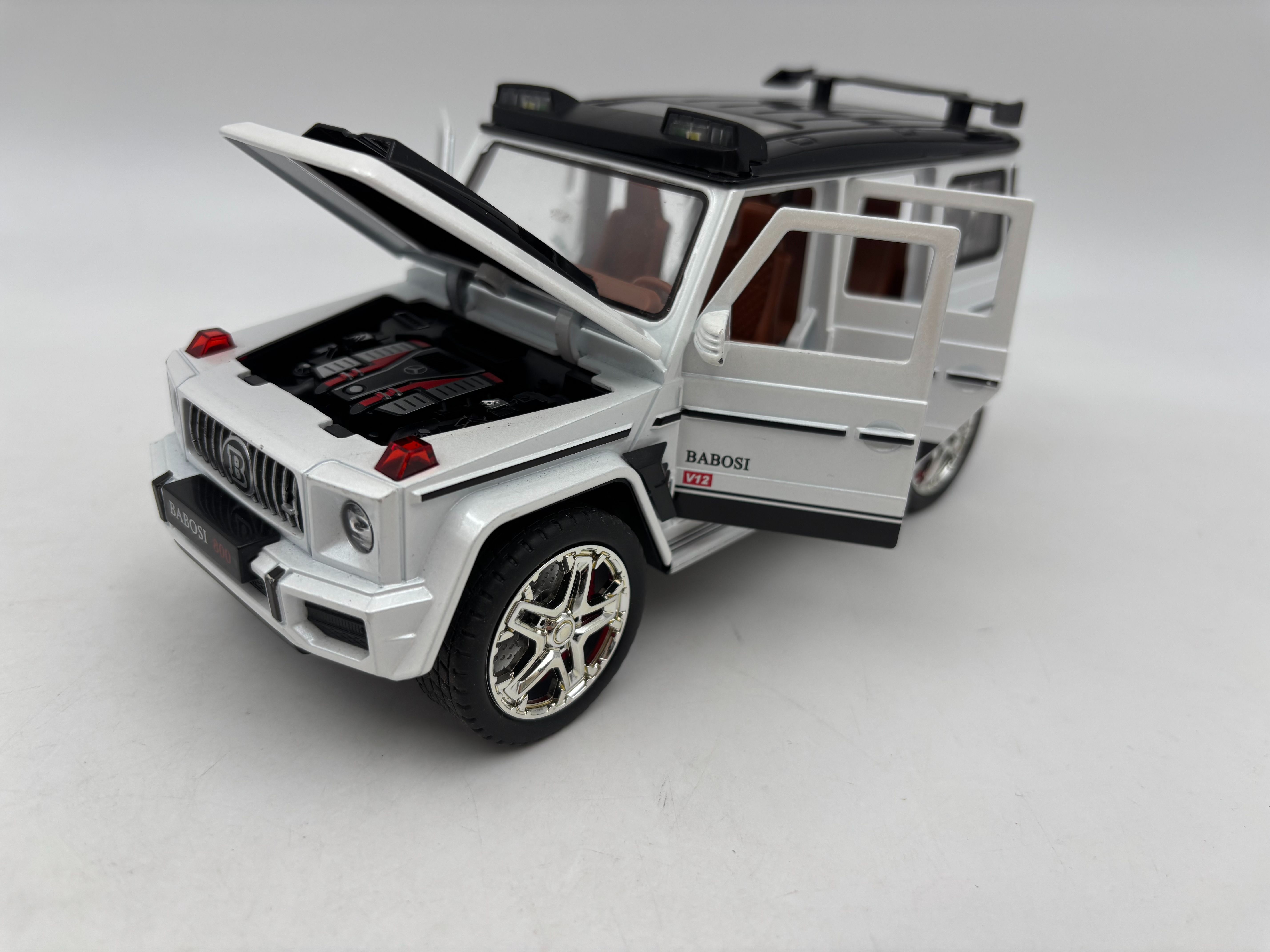 ماشین فلزی بنز جي کلاس برابوس سفید سایز 1/24 کد 2411 ای