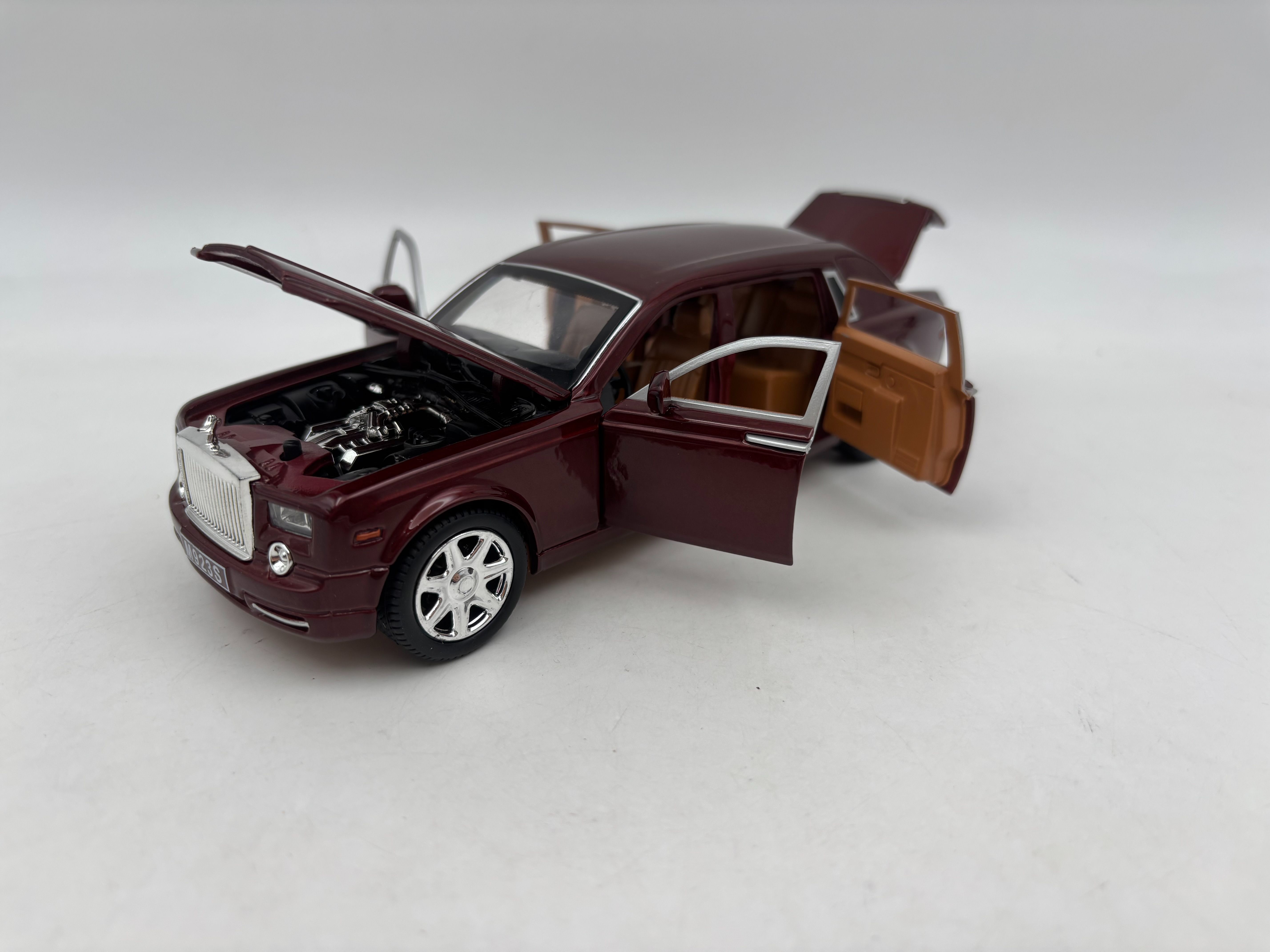 ماشین فلزی لیموزین رولزرویس زرشکی سایز1/24 کد M923S
