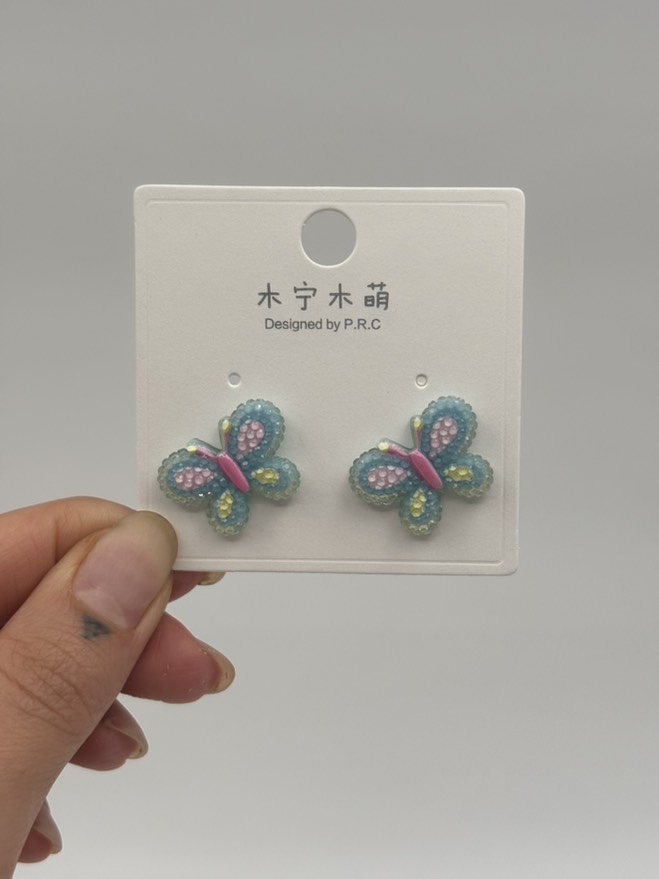 گوشواره فانتزی پروانه کریستالی آبی کد 2205