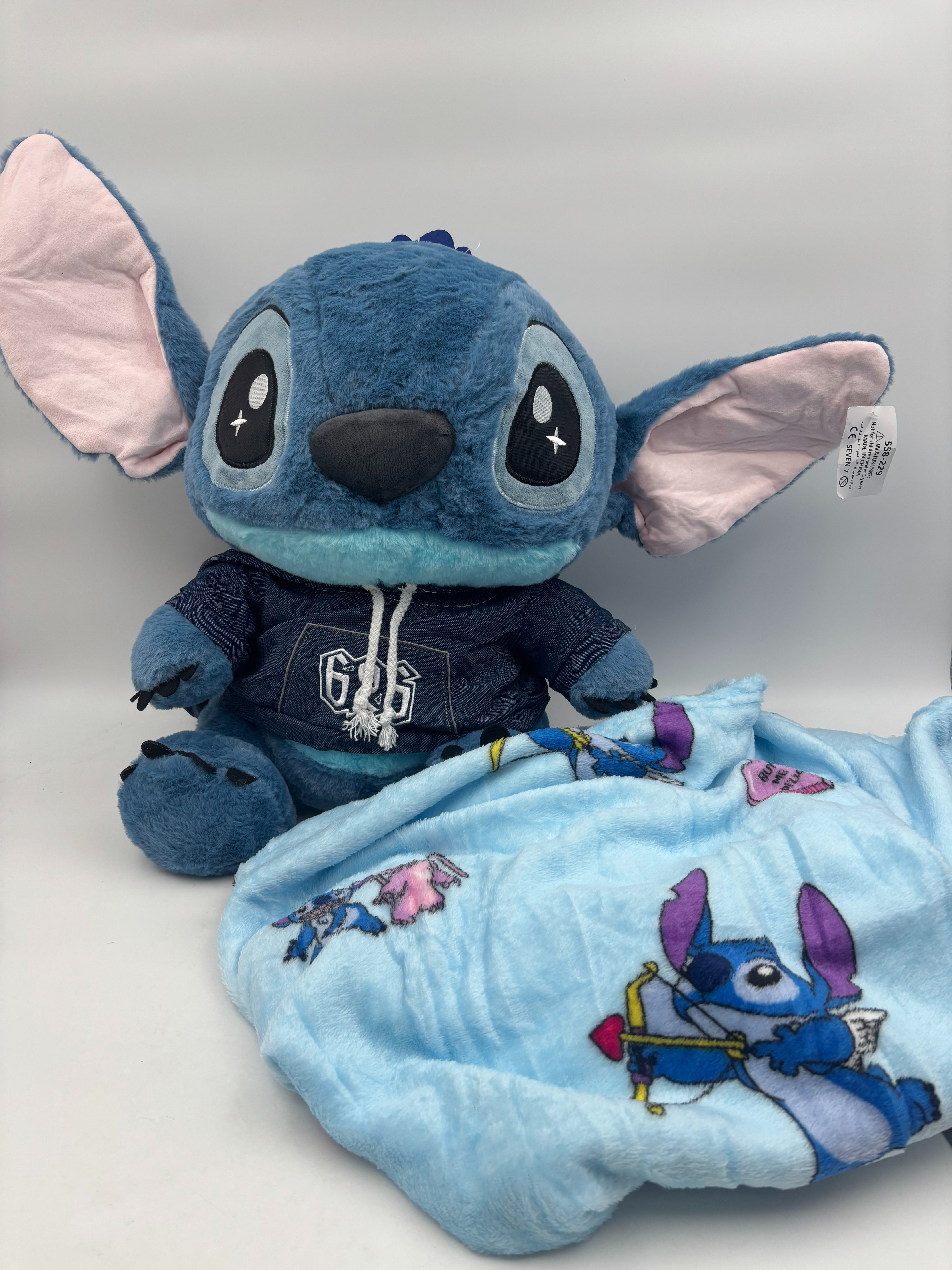 عروسک استیچ سویشرتی پتو طرح دار 40 سانتی