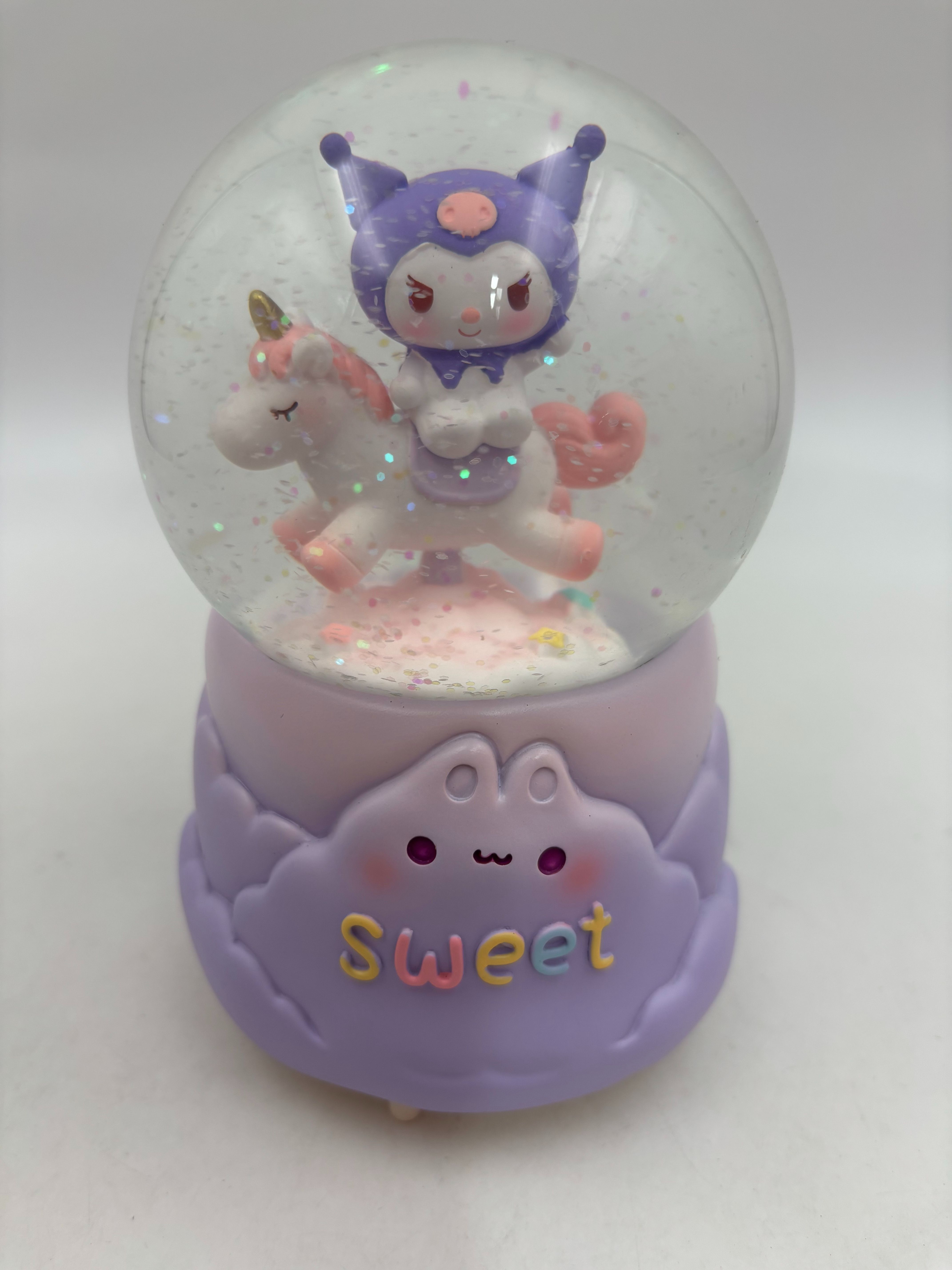 گوی پمپی بزرگ عروسک چرخان طرح کرومی بنفش سوار بر اسب تکشاخ