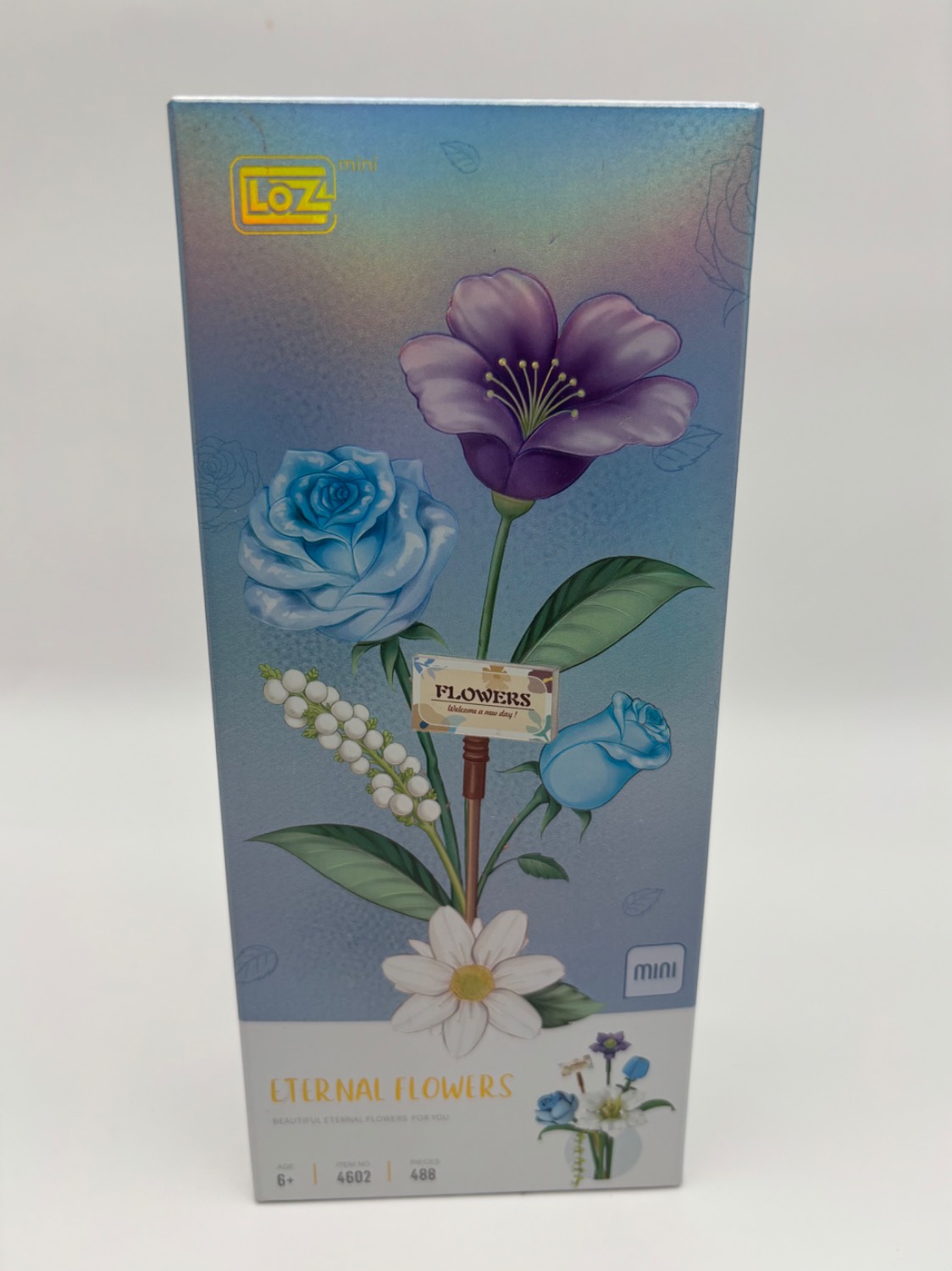 مینی لگو دسته گل ابدی مدل رزآبی زنگوله ای بنفش، کوکب سفید 488 قطعه کد 4602