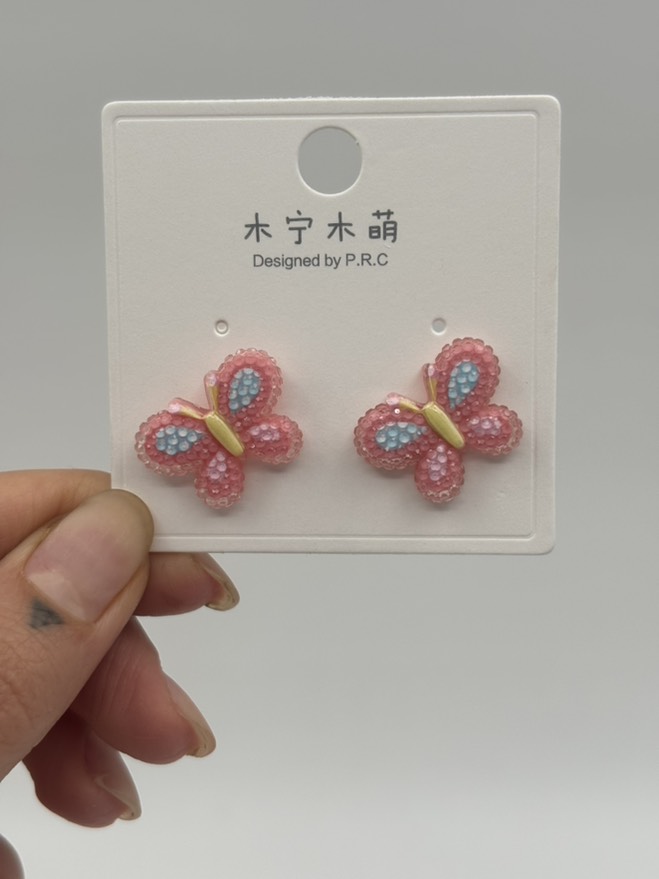 گوشواره فانتزی پروانه کریستالی گلبهی کد 2205